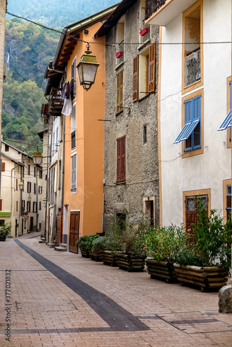 Alley between old houses in the small and charming commune of Isola, Provence-Alpes-Côte d'Azur region, Alpes-Maritimes, France © Raphael