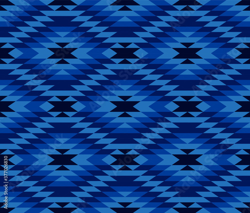 Tribal and ethnic pattern in blue geometric triangle, seamless vector abstract background for fashion