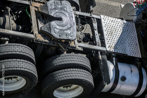 Obraz na plátne Frame and chassis of a big rig semi truck tractor with double wheels and a fifth