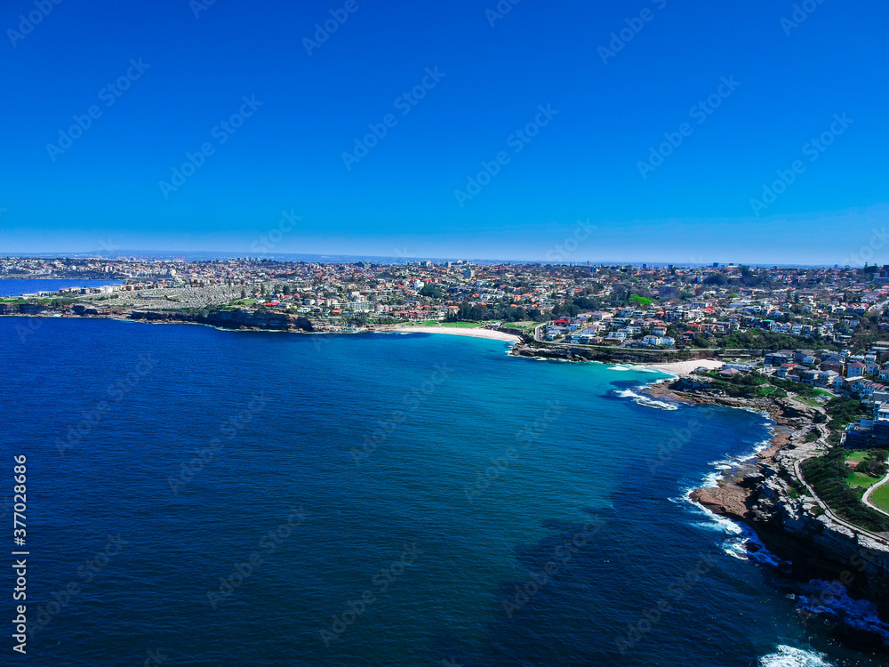 Panoramic  Aerial Drone View of  Bondi Beach Sydney NSW Australia houses on the cliff