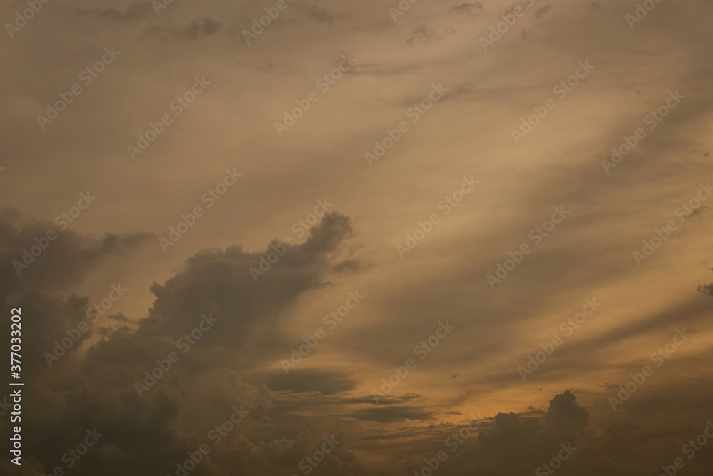 Beautiful sunset sky above clouds with dramatic light Beautiful sunset sky above clouds with dramatic light