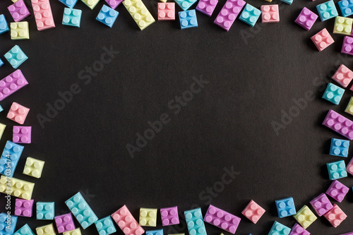 Frame toy blocks on black background