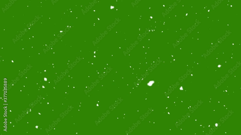 Snow falling on green background Snow falling on green background