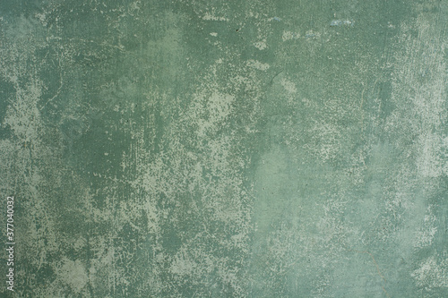 exture of an old light blue wall with peeling paint