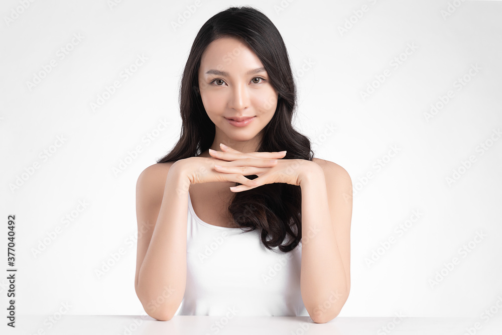 Beautiful young asian woman with clean fresh skin on white background, Face care, Facial treatment, Cosmetology, beauty and spa, Asian women portrait Beautiful young asian woman with clean fresh skin on white background, Face care, Facial treatment, Cosmetology, beauty and spa, Asian women portrait