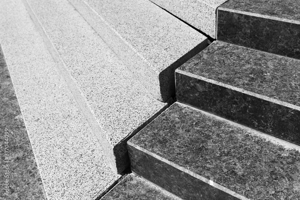 Stairs made of black and white granite stone