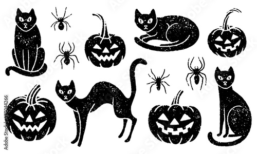 Grunge Halloween set of black cats, carved pumpkins, and spiders