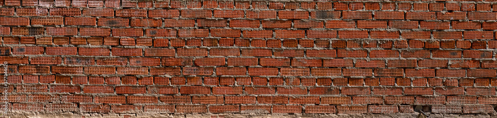 large panorama of the red brick wall
