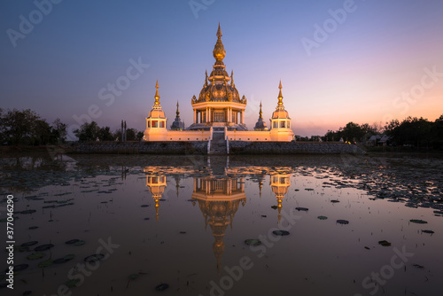 Beautiful buddhist pagoda with dusk sky © ChomchoeiFoto