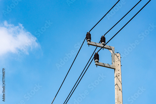 Wallpaper Mural Electricity distribution post with blue sky background. Torontodigital.ca