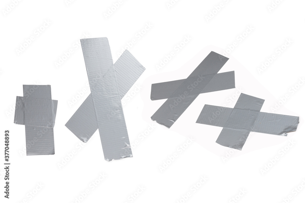 Silver scotch tape pieces isolated on white background. Silver scotch tape pieces isolated on white background.