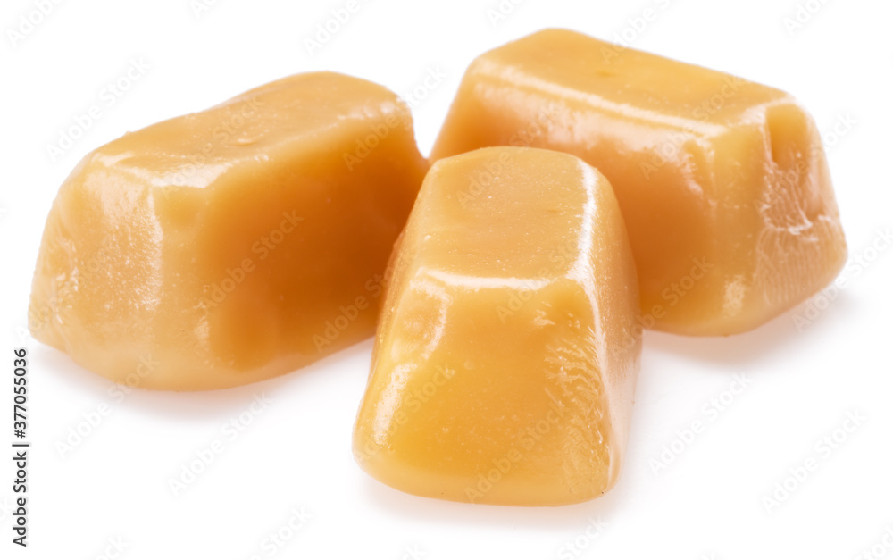 Toffee or candy caramel sweets isolated on white background. Toffee or candy caramel sweets isolated on white background.