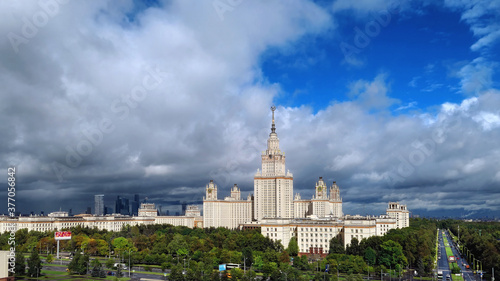 Aerial view of dramatic cloudy sky over main building of old university in Moscow