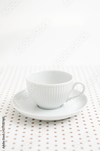 coffee cup on dot pattern paper