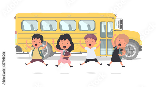 Happy children and a school bus. Children go to school. Yellow bus for school. Isolated. Vetkor.