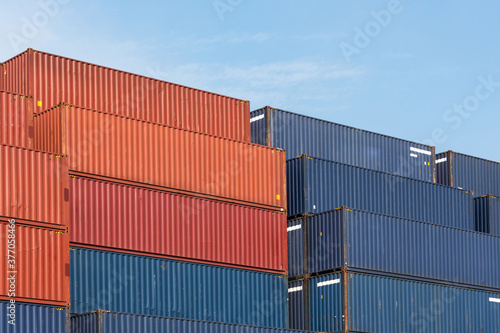 Colorful stack pattern of cargo shipping containers in shipping yard for import,export industrial