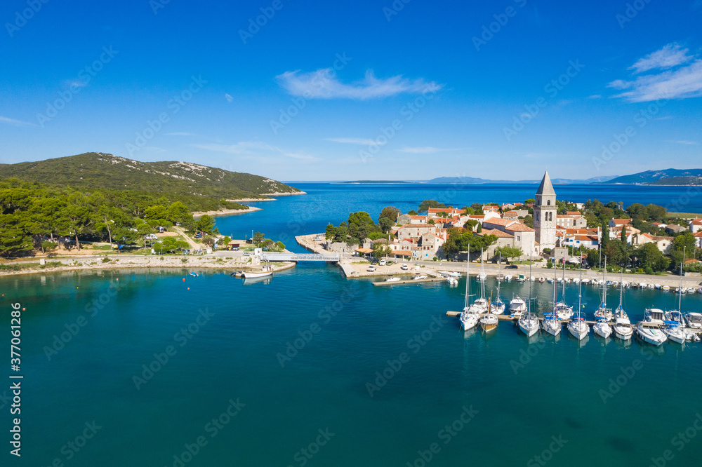 Aerial view of old historic town of Osor with bridge connecting islands Cres and Losinj, Croatia