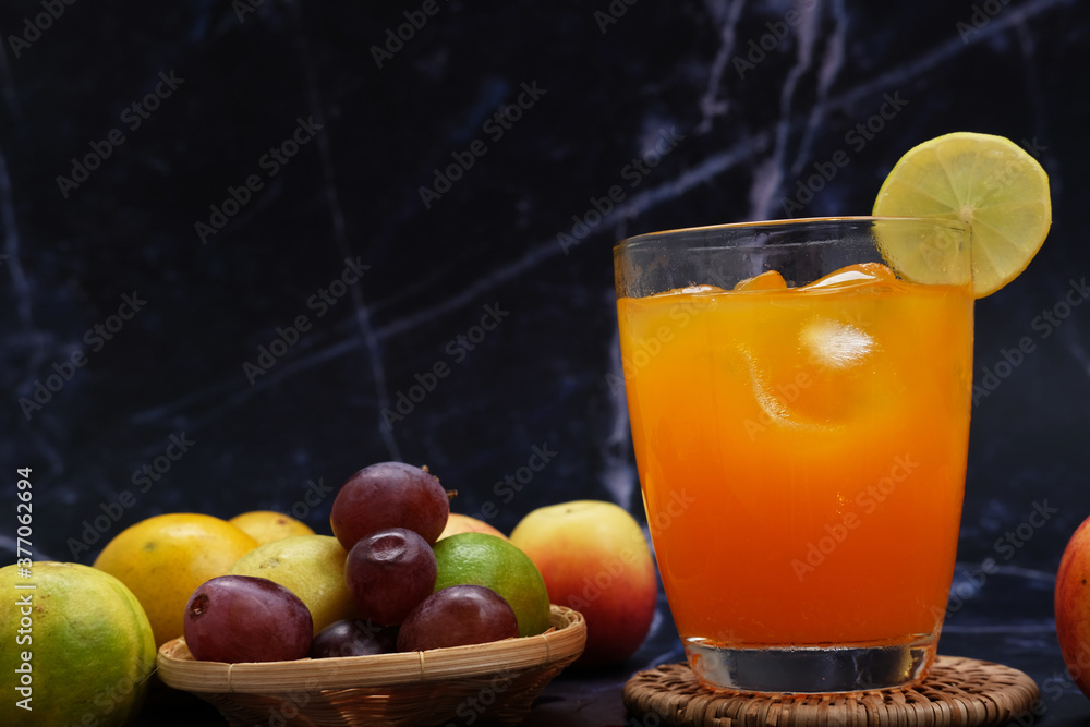orange juice in a glass with ice orange juice in a glass with ice