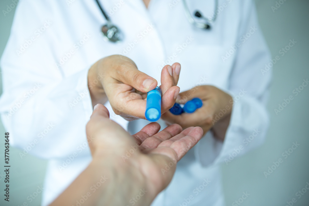 Healthcare - medication. Doctor with homeopathic pills.
