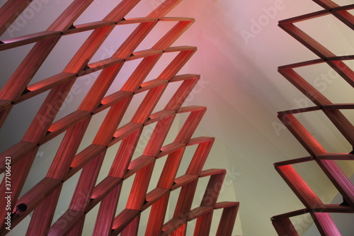 Wooden sculpture bathed in soft light.