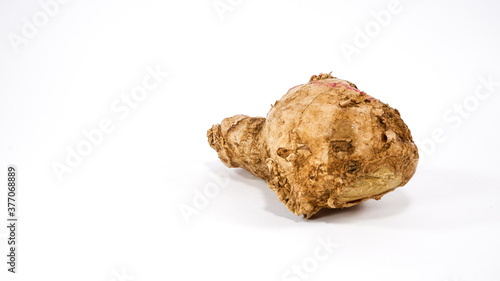 Close up shot of ginger clove on a white background