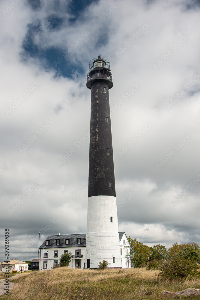 Sightseeing of Saaremaa island. Sõrve lighthouse is a popular landmark and scenic location on the Baltic sea coast