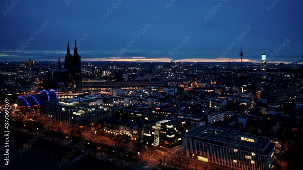 Westufer and cityscape at night, Cologne, North Rhine-Westphalia, Germany Westufer and cityscape at night, Cologne, North Rhine-Westphalia, Germany