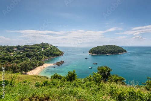 Turquoise Sea and quiet little cove Yanui Beach with Ko Man Island Background in Summer, Phuket, Thailand - View from the Windmill Viewpoint landmark