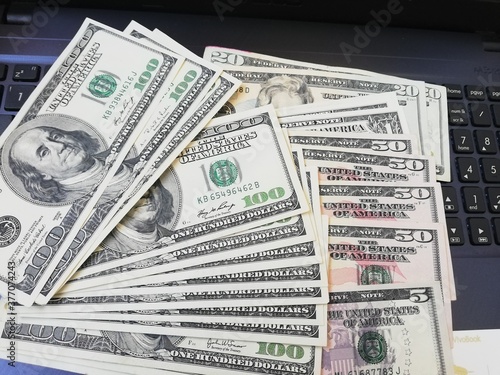 
Currency, Money, Dollar, Euro, wealth, dollar bills, fifty dollars, one hundred dollars, one dollar, twenty dollars, five hundred euros, two hundred euros, one hundred euros, fifty euros, success, in
