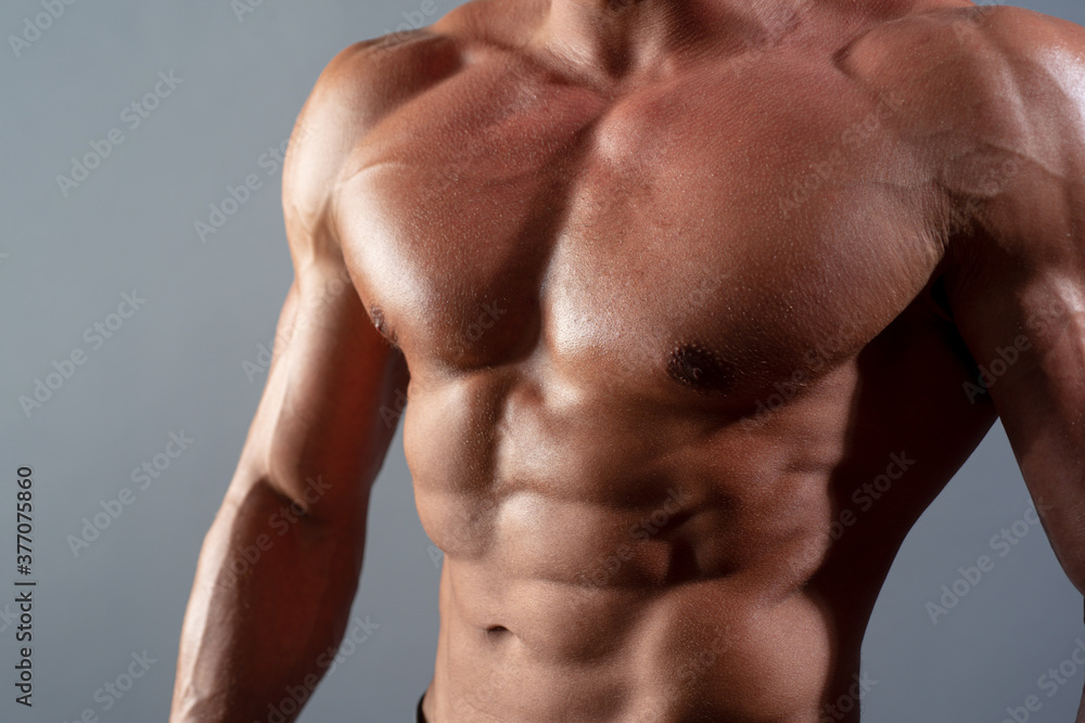 Handsome young mans torso closeup. Sexy naked torso, six pack abs. Handsome young mans torso closeup. Sexy naked torso, six pack abs.
