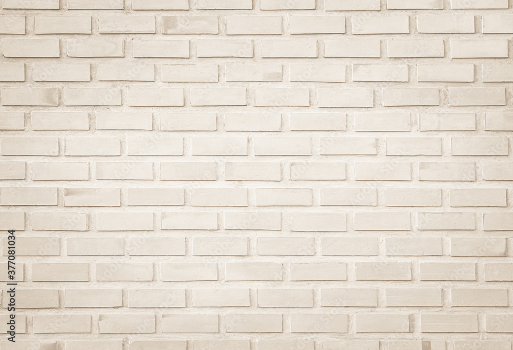 Empty Background of wide cream brick wall texture. Old brown brick wall concrete or stone pattern nature, wallpaper limestone abstract floor/Grid uneven interior rock. Home & office design backdrop.