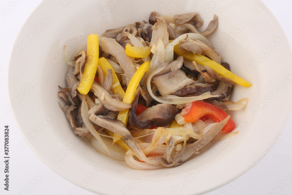 vegetables dish with paprika and onion and mushrooms as vegan food vegetables dish with paprika and onion and mushrooms as vegan food