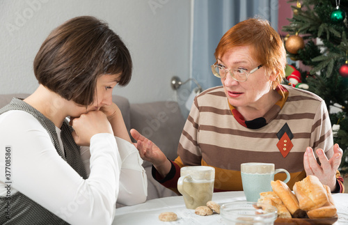 Slika na platnu Quarrel of mother and daughter at the Christmas table