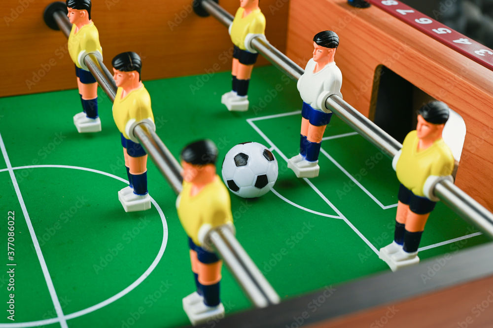 mini football with players and ball, close-up mini football with players and ball, close-up