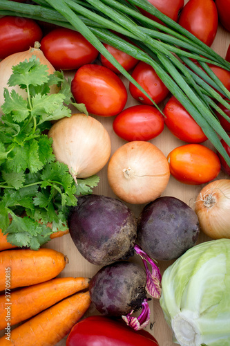 Fresh vegetables on a wooden worktop  closeup