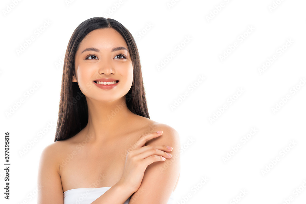 Asian woman touching shoulders and looking away isolated on white Asian woman touching shoulders and looking away isolated on white