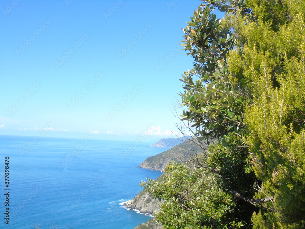 Liguria, Italy - 09/01/2020: Steep stairway overlooking the sea leading to the town of Monesteroli, in Liguria. Liguria, Italy - 09/01/2020: Steep stairway overlooking the sea leading to the town of Monesteroli, in Liguria.