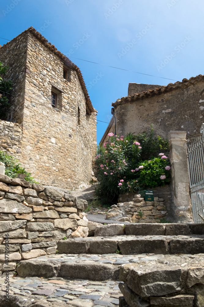 The medieval stone architecture and the old narrow street of Minerve, the most beautiful medieval village of France, located in the picturesque mountain  valley in Pyrenees