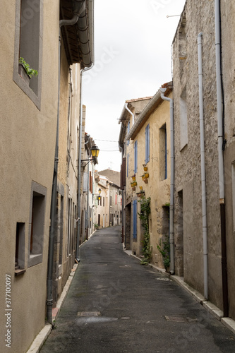 The medieval stone architecture and the old narrow street of Lagrasse  the most beautiful medieval village of France  located in the picturesque mountain  valley in Pyrenees