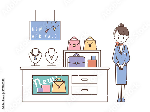 ブランドショップで接客する女性スタッフ