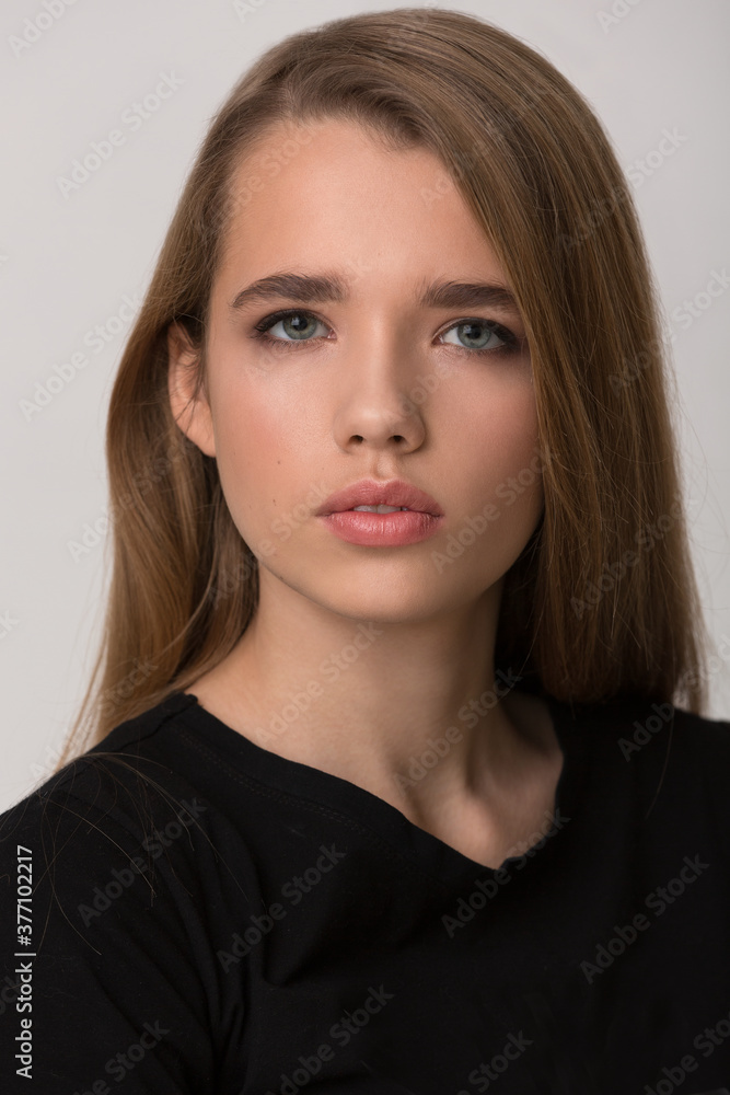 Portrait of a blonde girl with a beautiful and stylish face Portrait of a blonde girl with a beautiful and stylish face