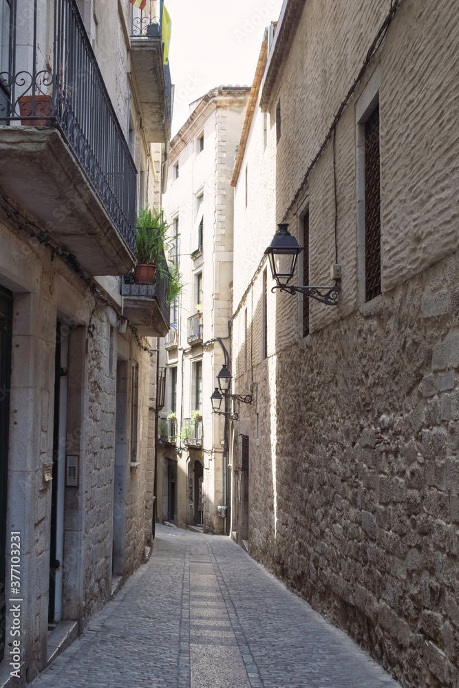 The beautiful medieval architecture and narrow streets of ancient town of Girona, Spain