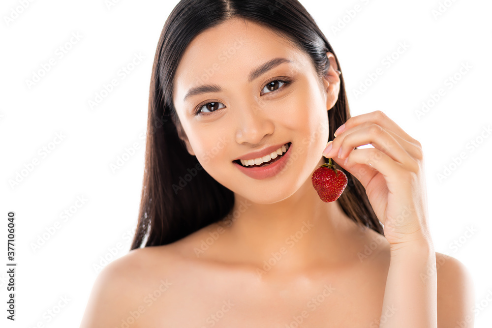 nude asian woman holding juicy strawberry while looking at camera isolated on white nude asian woman holding juicy strawberry while looking at camera isolated on white