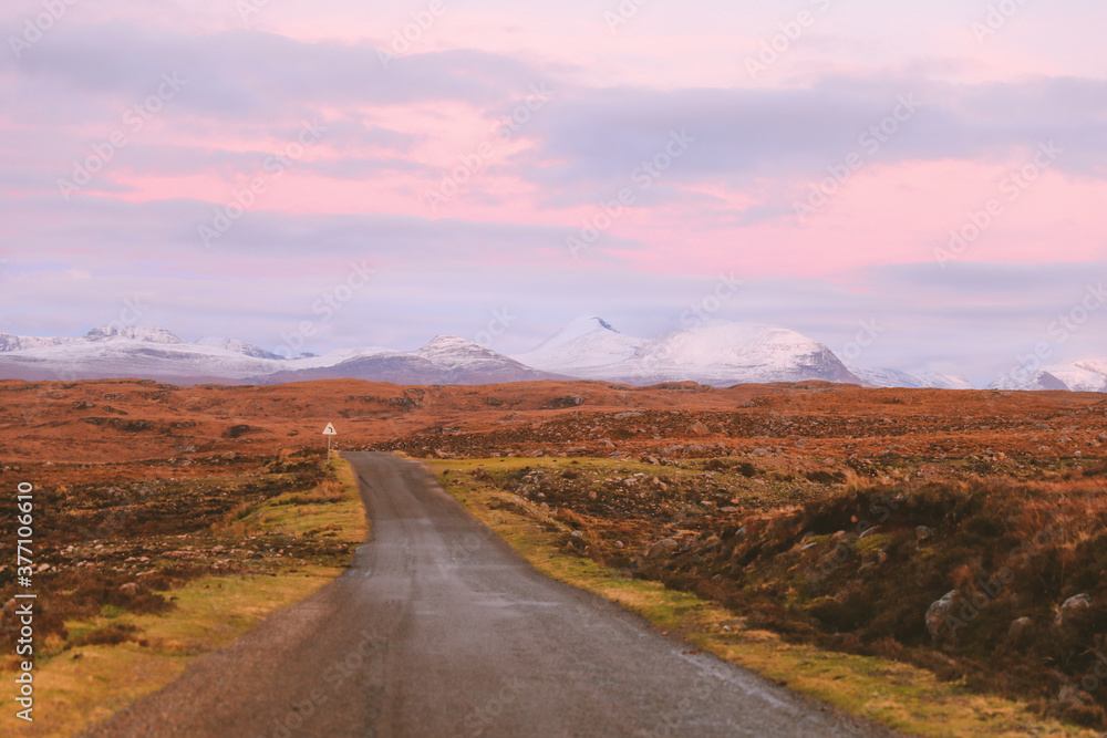 Country road at sunset, Applecross peninsula, Scottish highlands,