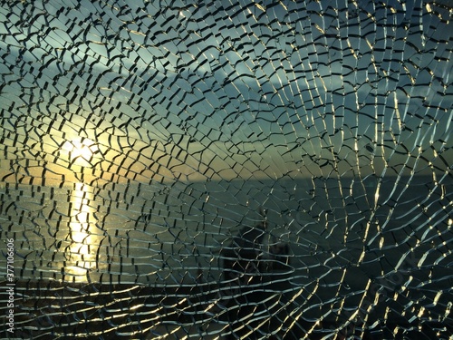 broken glass at sunset. background