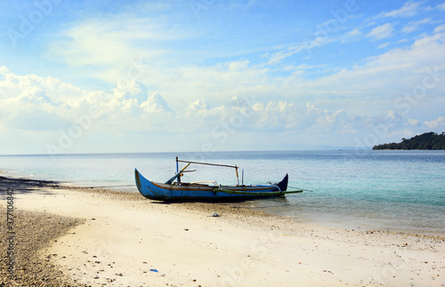 boat on the beach country © Dadan Bahtera