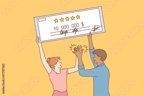 Success, winning, luck, gambling, goal achievement concept. Young happy couple african american man woman standing with huge dollar bill giving high five. Successful jackpot and reaching purposes.