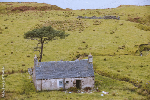 Abandoned farmhouse by the sea, Kalnakill, Scottish highlands photo