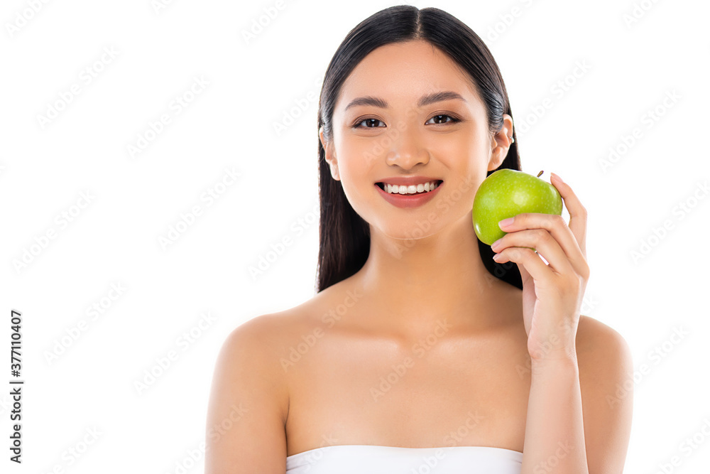 Excited young asian woman looking at camera and holding apple isolated on white Excited young asian woman looking at camera and holding apple isolated on white