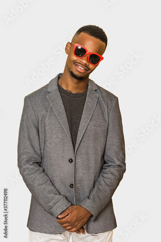 Friendly ethnic guy in smart casual clothes © Juan Algar